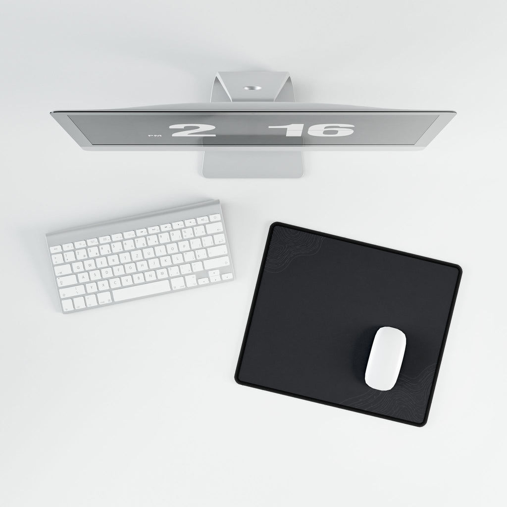 Printify preview: Minimal Graphite Shadow, 14.4 × 12.1 inches, overhead desk view with keyboard and mouse.