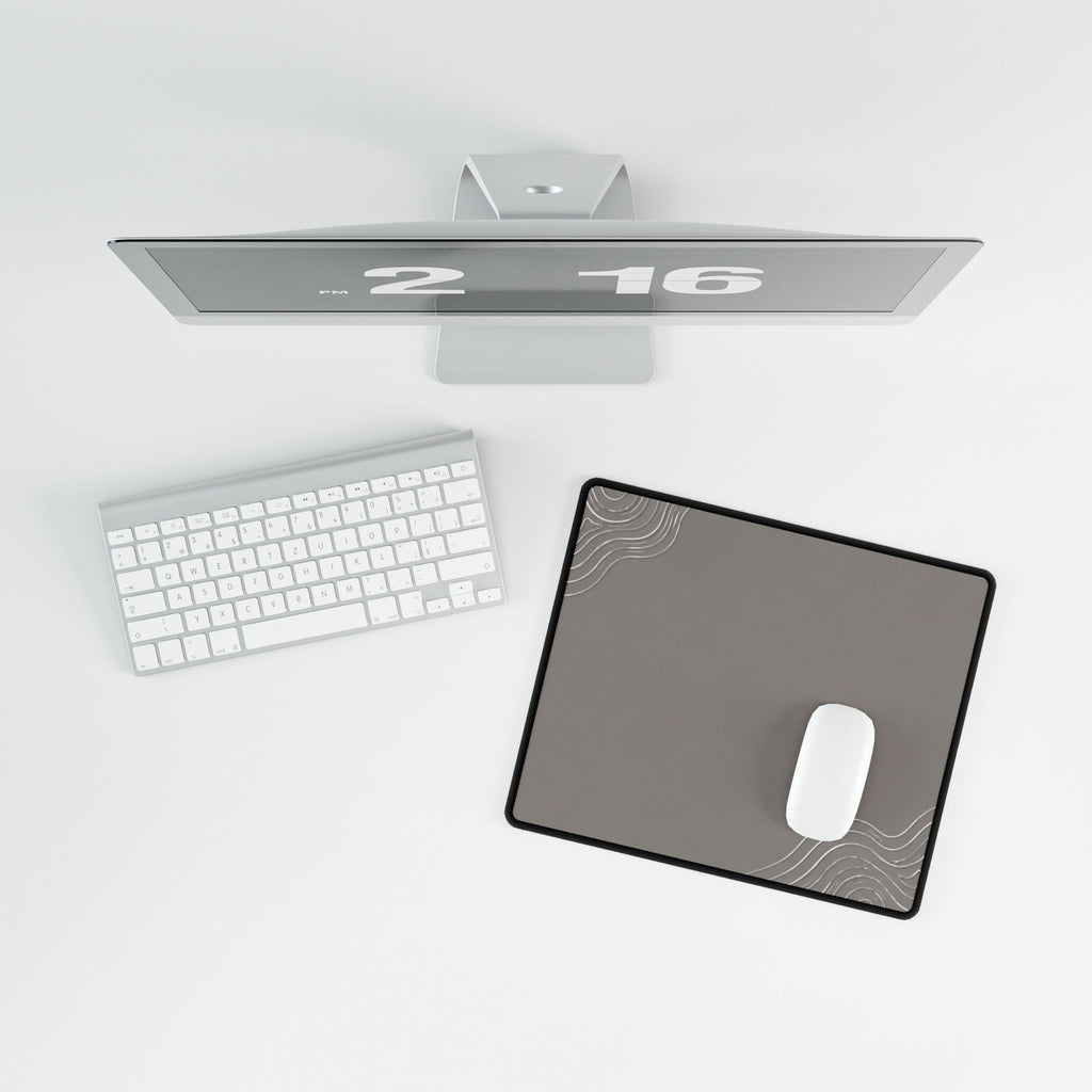 Overhead view of Minimal Stone Grey compact desk mat with a mouse beside the keyboard.
