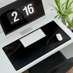Printify preview: Obsidian Cutaway, 31.5 × 15.5 inches, with keyboard and mouse on a white desk, viewed at an angle.