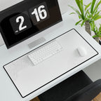 Minimal White desk mat in a wide format, shown with a keyboard and mouse on a white desk.