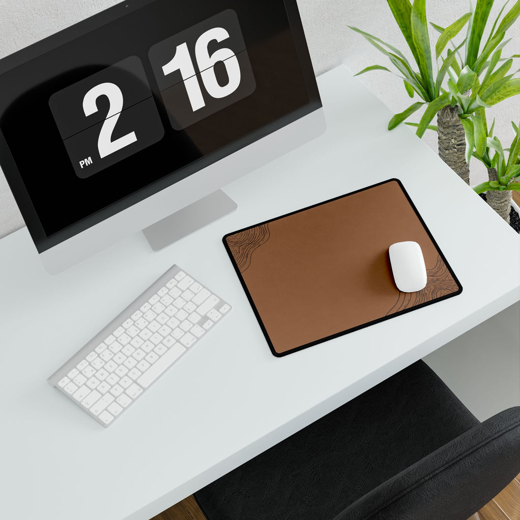 Printify preview: Minimal Cognac Ink, 14.4 × 12.1 inches, angled desk view with keyboard and mouse.