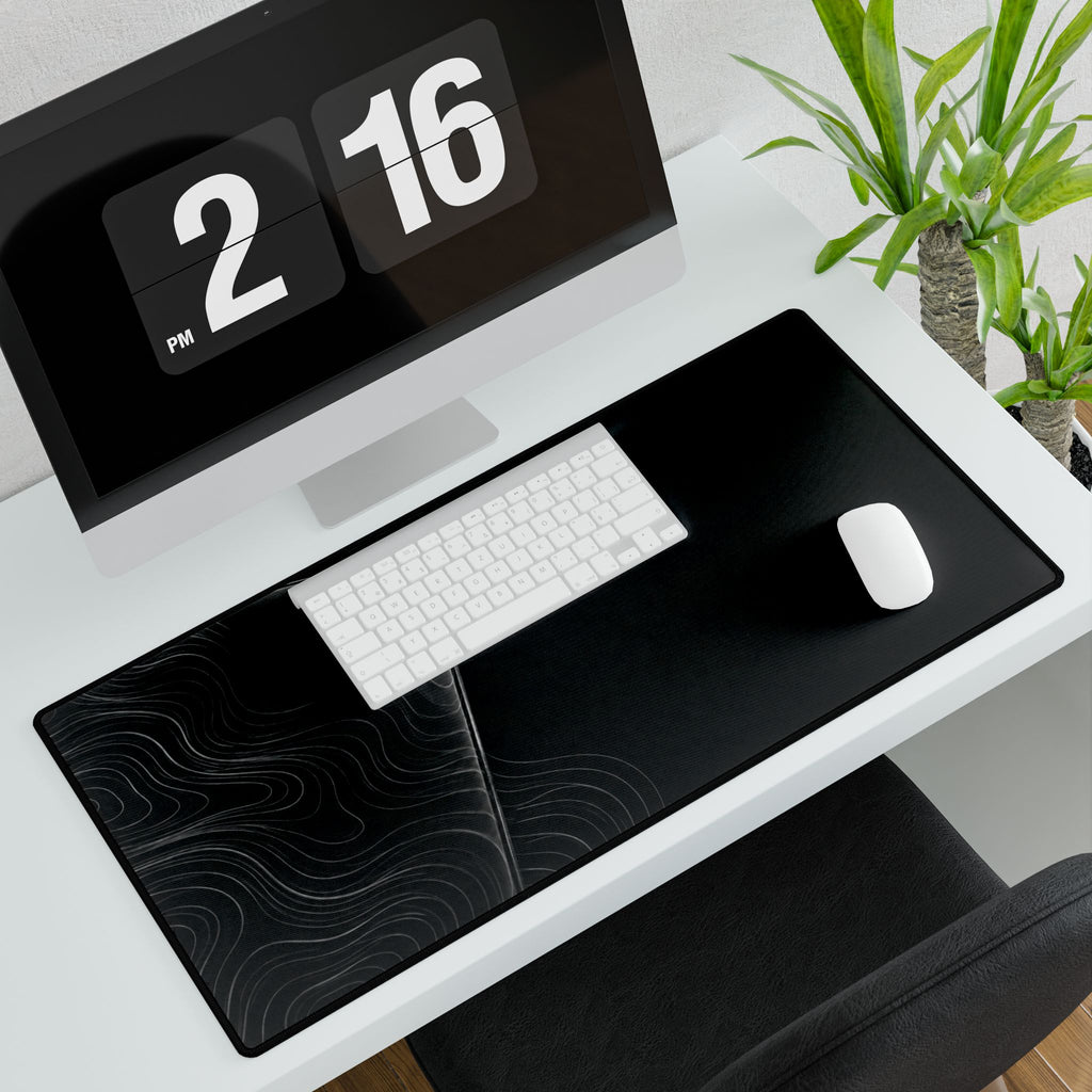 Printify preview: Graphite Optic, 31.5 × 15.5 inches, with keyboard and mouse on a white desk, viewed at an angle.