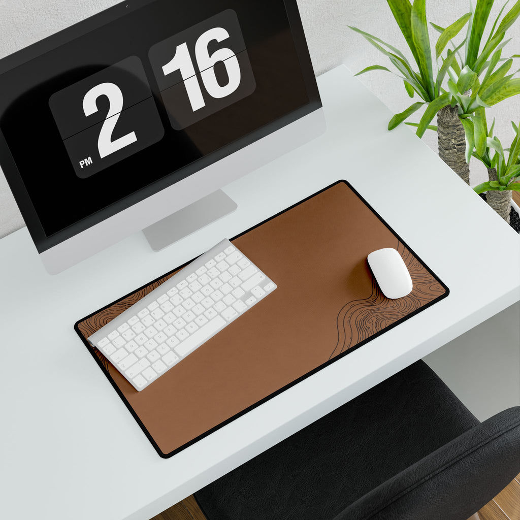 Printify preview: Minimal Cognac Ink, 23.6 × 13.8 inches, angled desk view with keyboard and mouse.