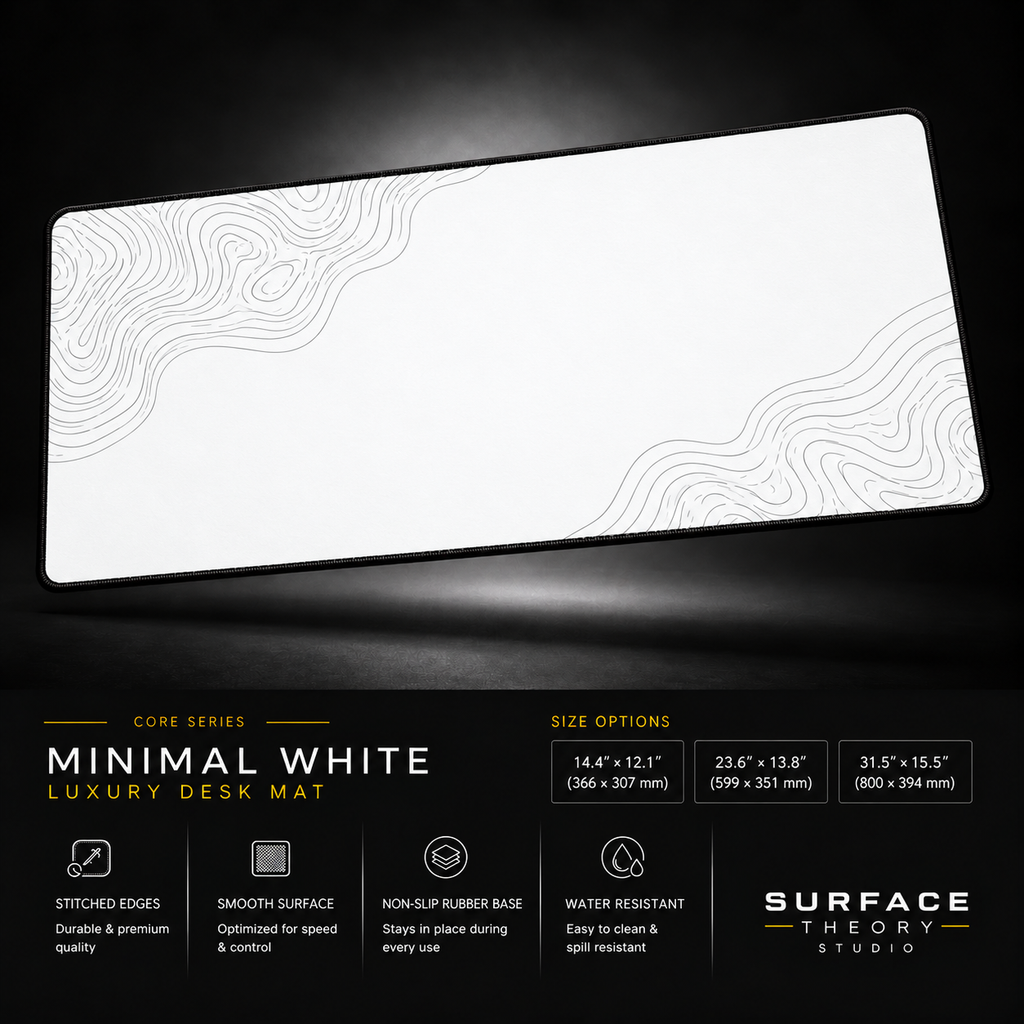 Minimal White desk mat floating against a dark studio background.
