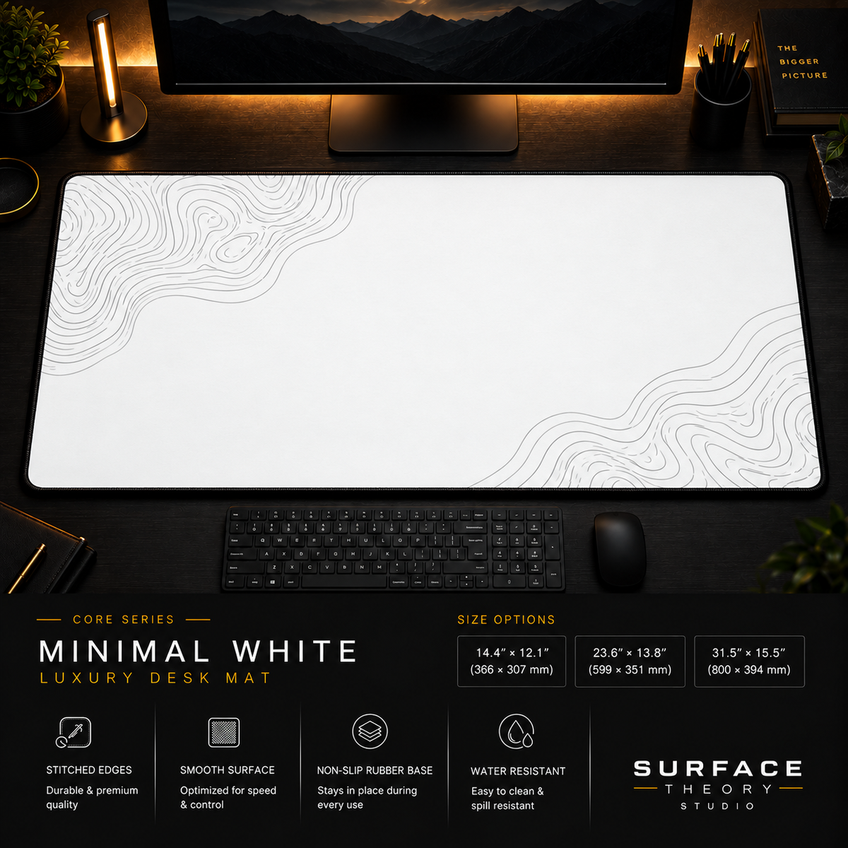 Minimal White desk mat in a dark workstation with a keyboard, mouse and warm monitor lighting.