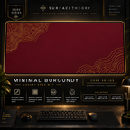 Minimal Burgundy desk mat in a gold-toned display frame above a keyboard.
