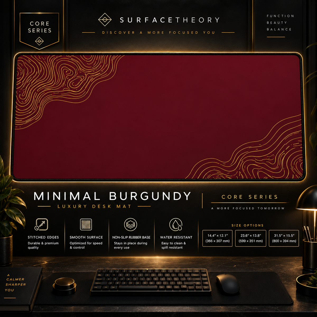 Minimal Burgundy desk mat in a gold-toned display frame above a keyboard.