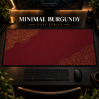Minimal Burgundy desk mat with gold-toned contour lines on burgundy, shown in a warm, dark desk setup.