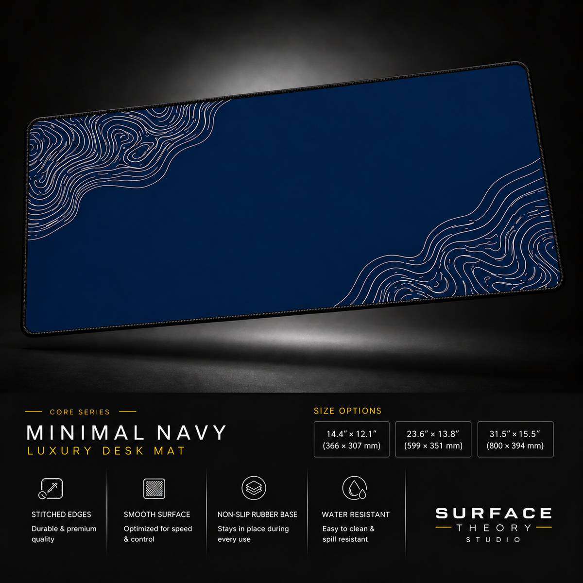 Minimal Navy desk mat floating against a dark studio background.