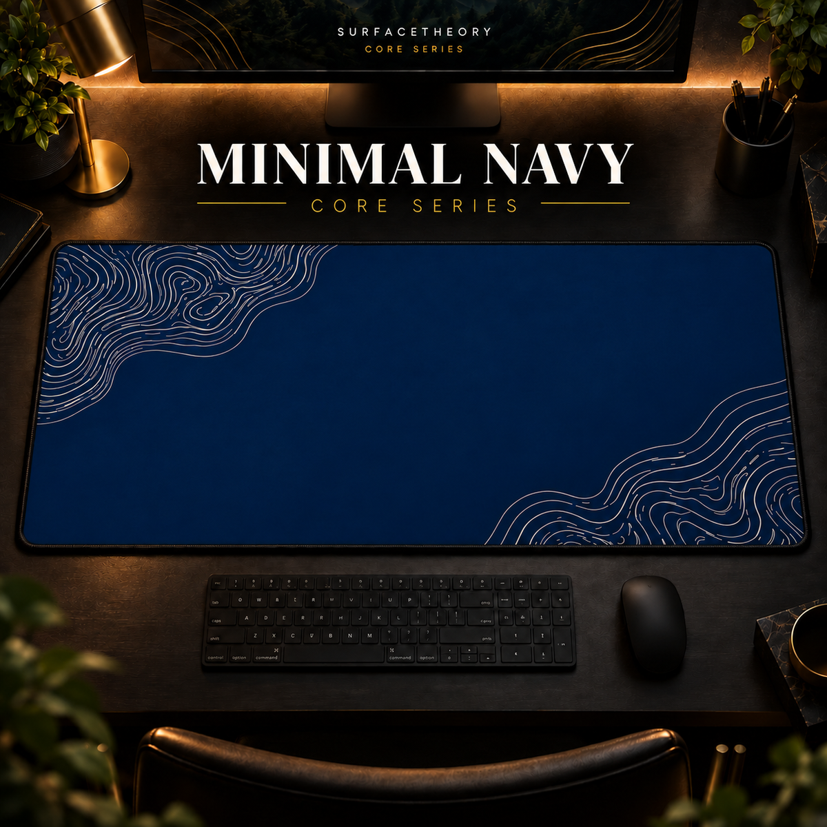 Minimal Navy desk mat with pale contour lines on navy blue, shown in a warm, dark desk setup.