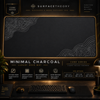 Minimal Charcoal desk mat in a gold-toned display frame above a keyboard.