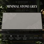 Minimal Stone Grey desk mat on a stone display with size and product-detail information.