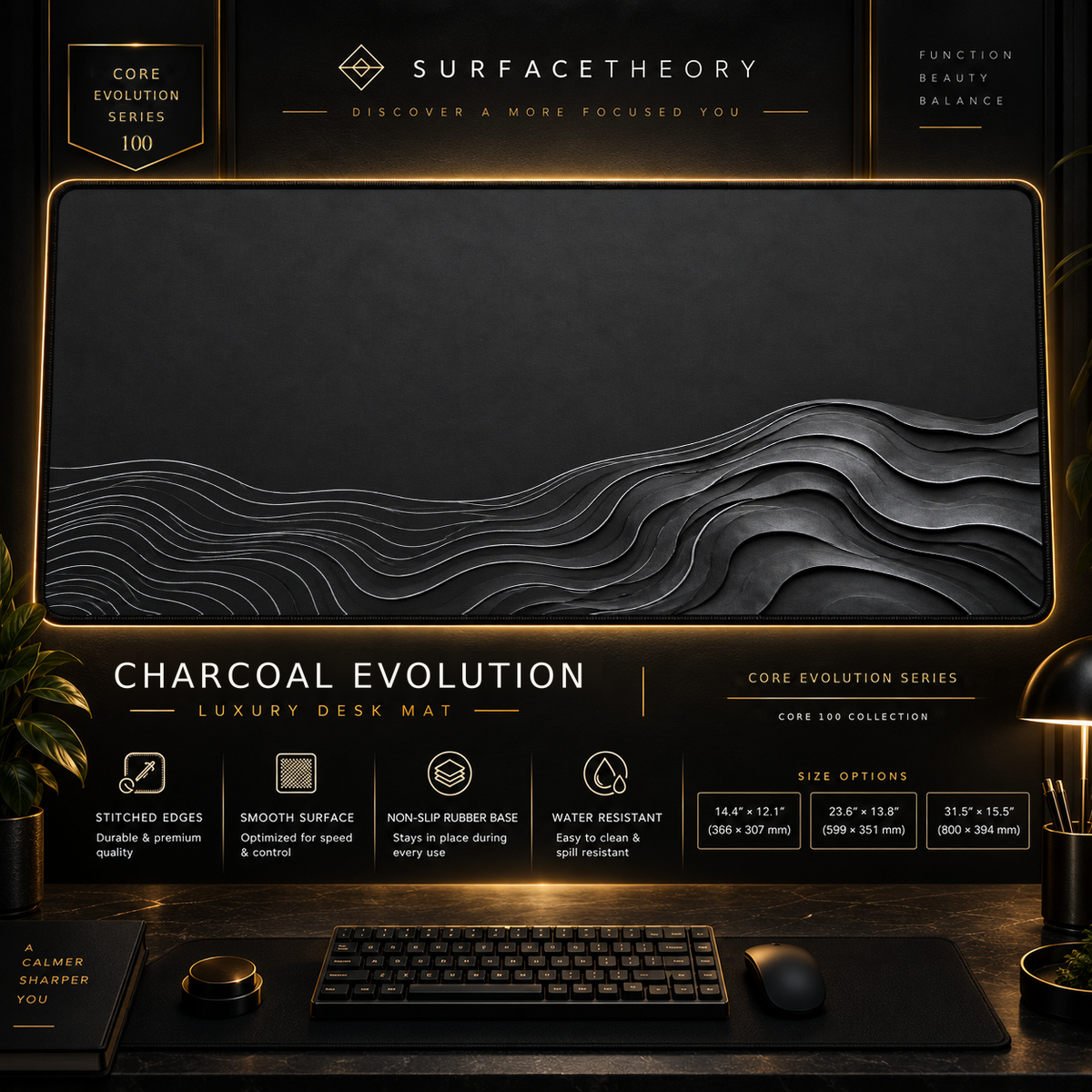 Charcoal Evolution desk mat in a gold-toned showcase frame above a keyboard.