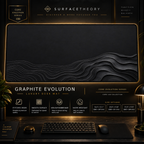 Graphite Evolution desk mat in a gold-toned showcase frame above a keyboard.