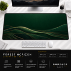 Forest Horizon desk mat beneath a monitor on a bright desk with a white keyboard and mouse.