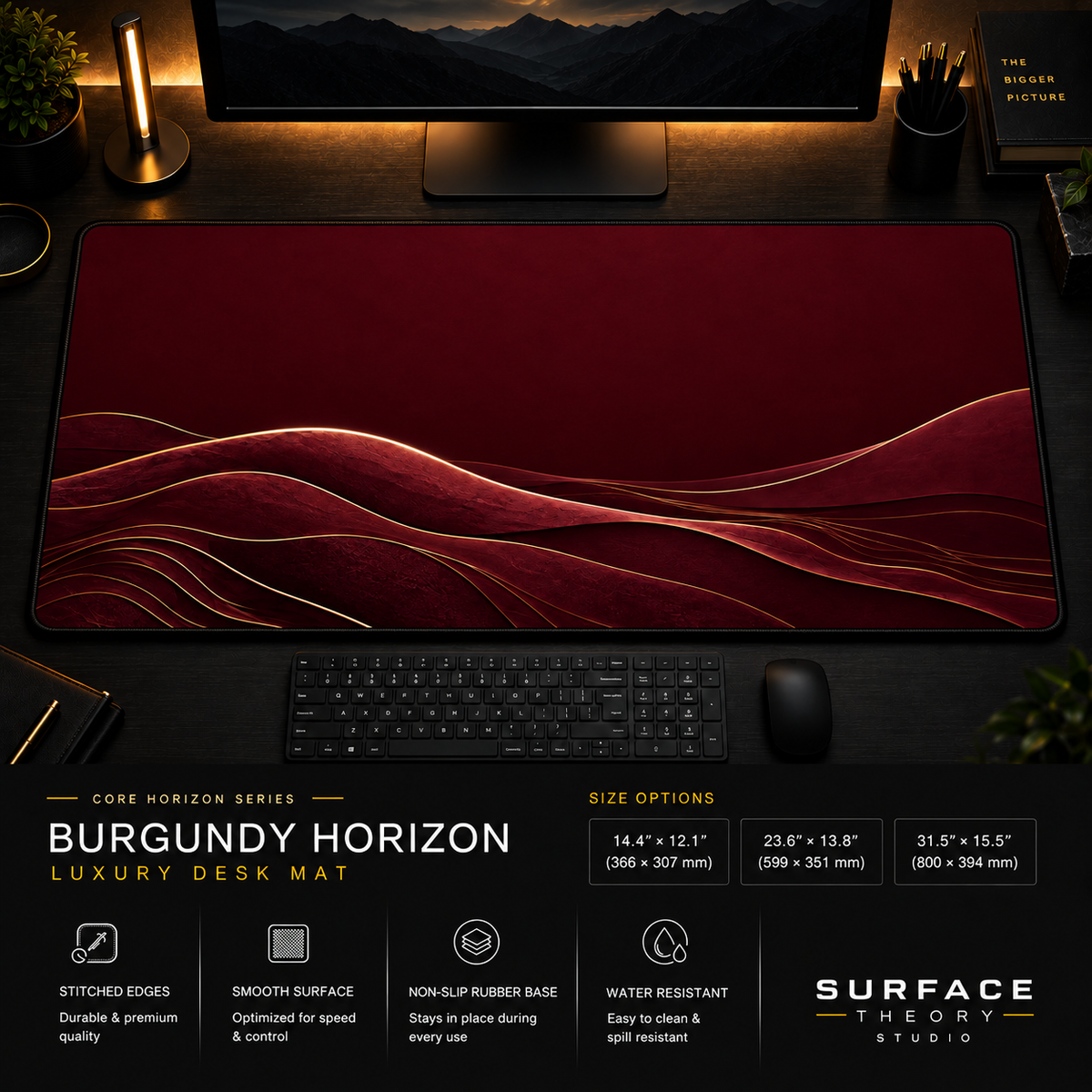 Burgundy Horizon desk mat in a dark workstation with warm monitor lighting.