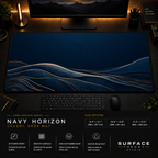 Navy Horizon desk mat in a dark workstation with warm monitor lighting.