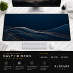 Navy Horizon desk mat beneath a monitor on a bright desk with a white keyboard and mouse.