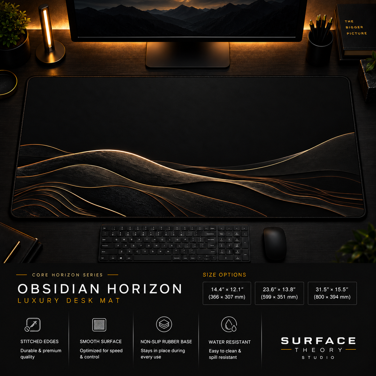 Obsidian Horizon desk mat in a dark workstation with warm monitor lighting.