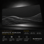 Graphite Horizon desk mat floating against a dark studio background.