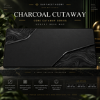 Charcoal Cutaway desk mat on a studio display with size and product information.