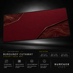 Burgundy Cutaway desk mat floating against a dark studio background.