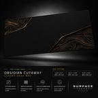 Obsidian Cutaway desk mat floating against a dark studio background.