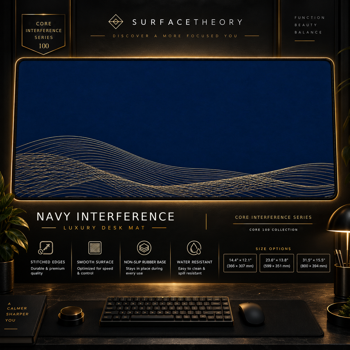 Navy Interference desk mat in a gold-toned showcase frame above a keyboard.
