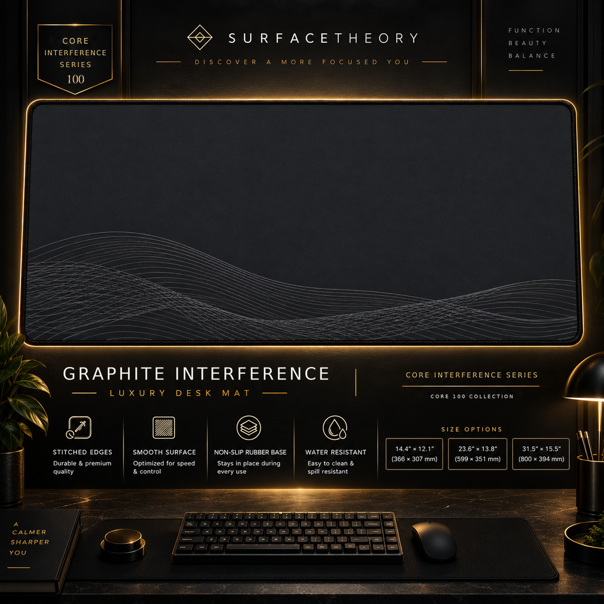 Graphite Interference desk mat in a gold-toned showcase frame above a keyboard.
