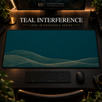 Teal Interference desk mat, deep teal with overlapping champagne-toned curves along the lower edge, in a warm, dark workspace.