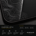 Close-up of Charcoal Optic printed artwork and black stitched corner.