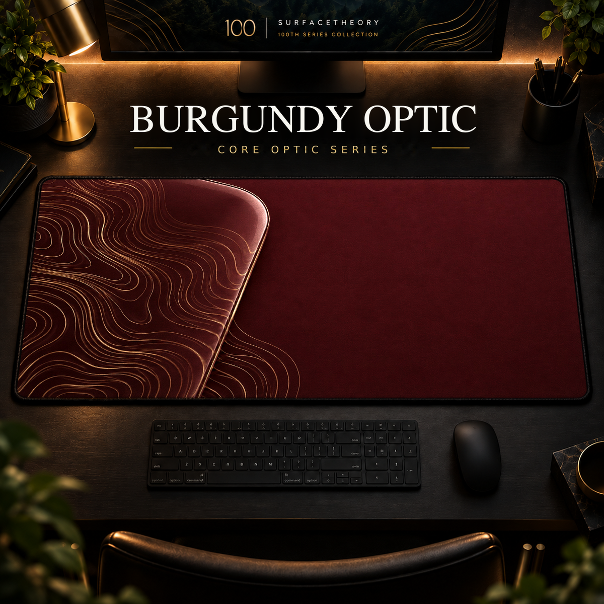 Burgundy Optic desk mat, burgundy with gold-toned contours in a rounded form on the left, in a warm, dark workspace.