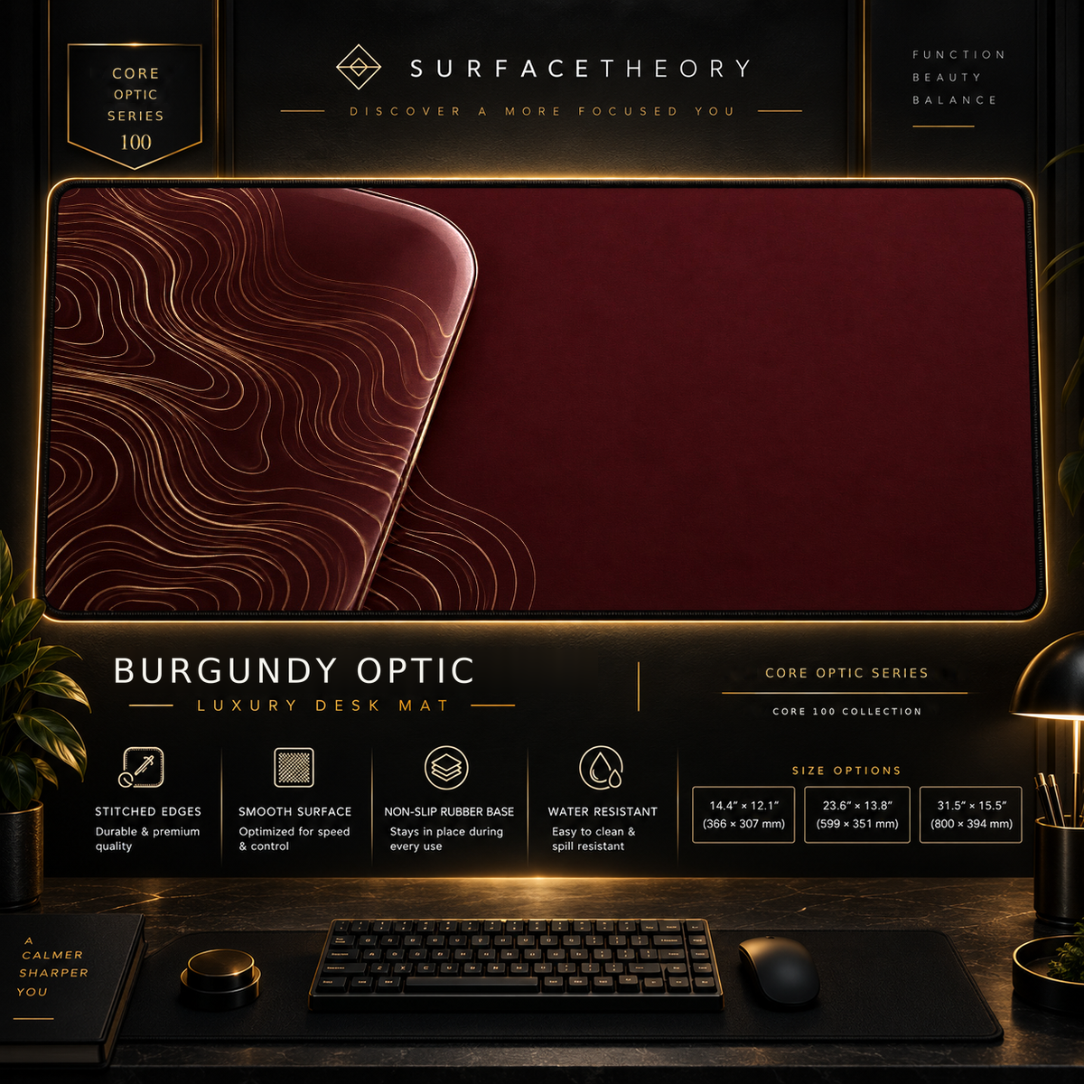 Burgundy Optic desk mat in a gold-toned showcase frame above a keyboard.
