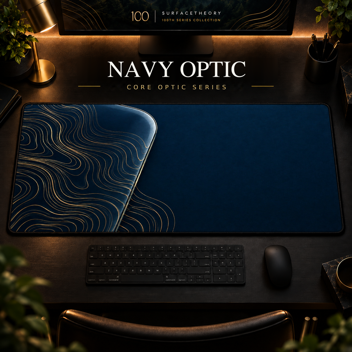 Navy Optic desk mat, navy blue with gold-toned contours in a rounded form on the left, in a warm, dark workspace.