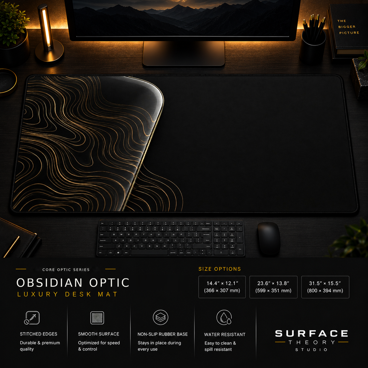 Obsidian Optic desk mat in a dark workstation with warm monitor lighting.
