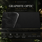 Graphite Optic desk mat on a studio display with size and product information.