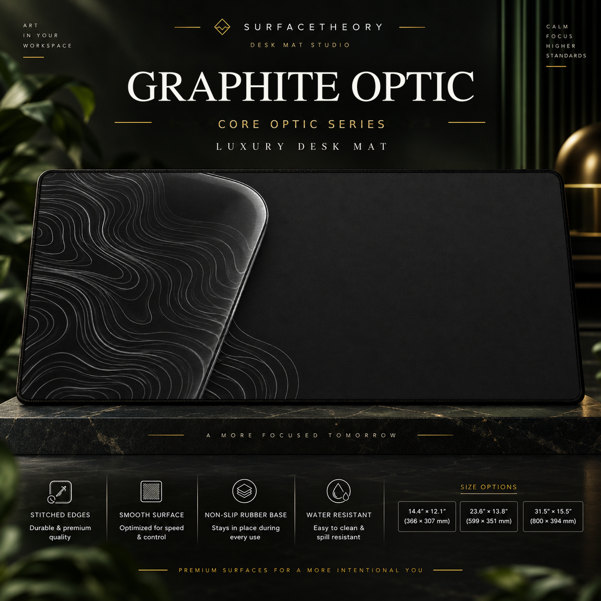 Graphite Optic desk mat on a studio display with size and product information.