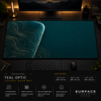 Teal Optic desk mat in a dark workstation with warm monitor lighting.