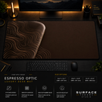 Espresso Optic desk mat in a dark workstation with warm monitor lighting.