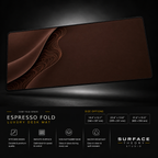 Espresso Fold desk mat floating against a dark studio background.