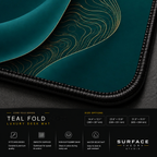 Close-up of Teal Fold printed artwork and black stitched corner.