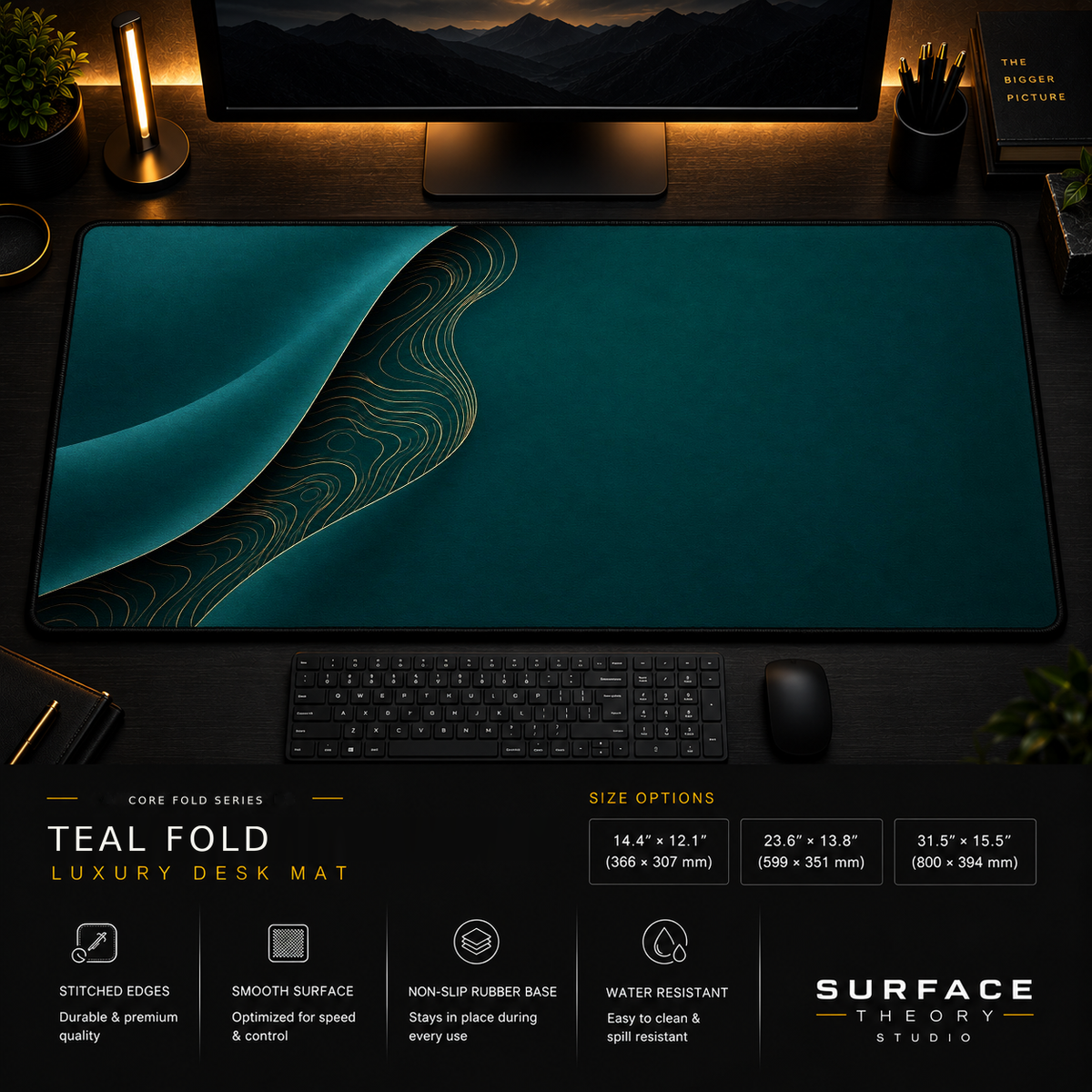Teal Fold desk mat in a dark workstation with warm monitor lighting.