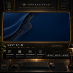 Navy Fold desk mat in a gold-toned showcase frame above a keyboard.
