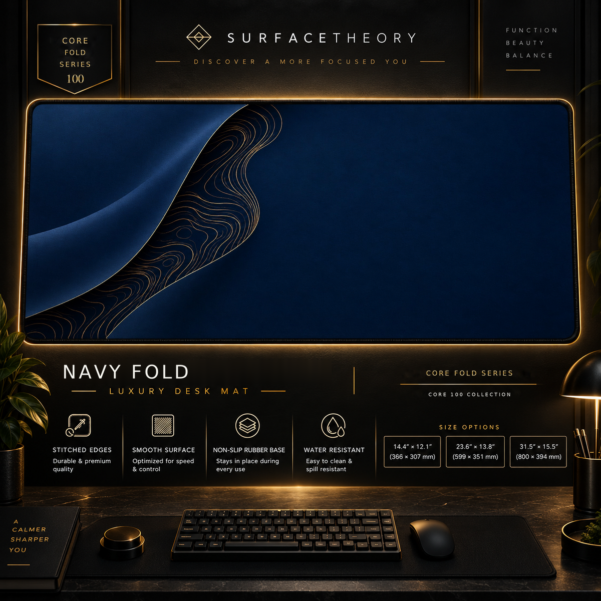 Navy Fold desk mat in a gold-toned showcase frame above a keyboard.