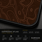 Close-up of Espresso Atlas printed artwork and black stitched corner.