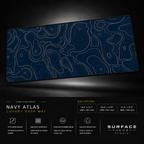 Navy Atlas desk mat floating against a dark studio background.