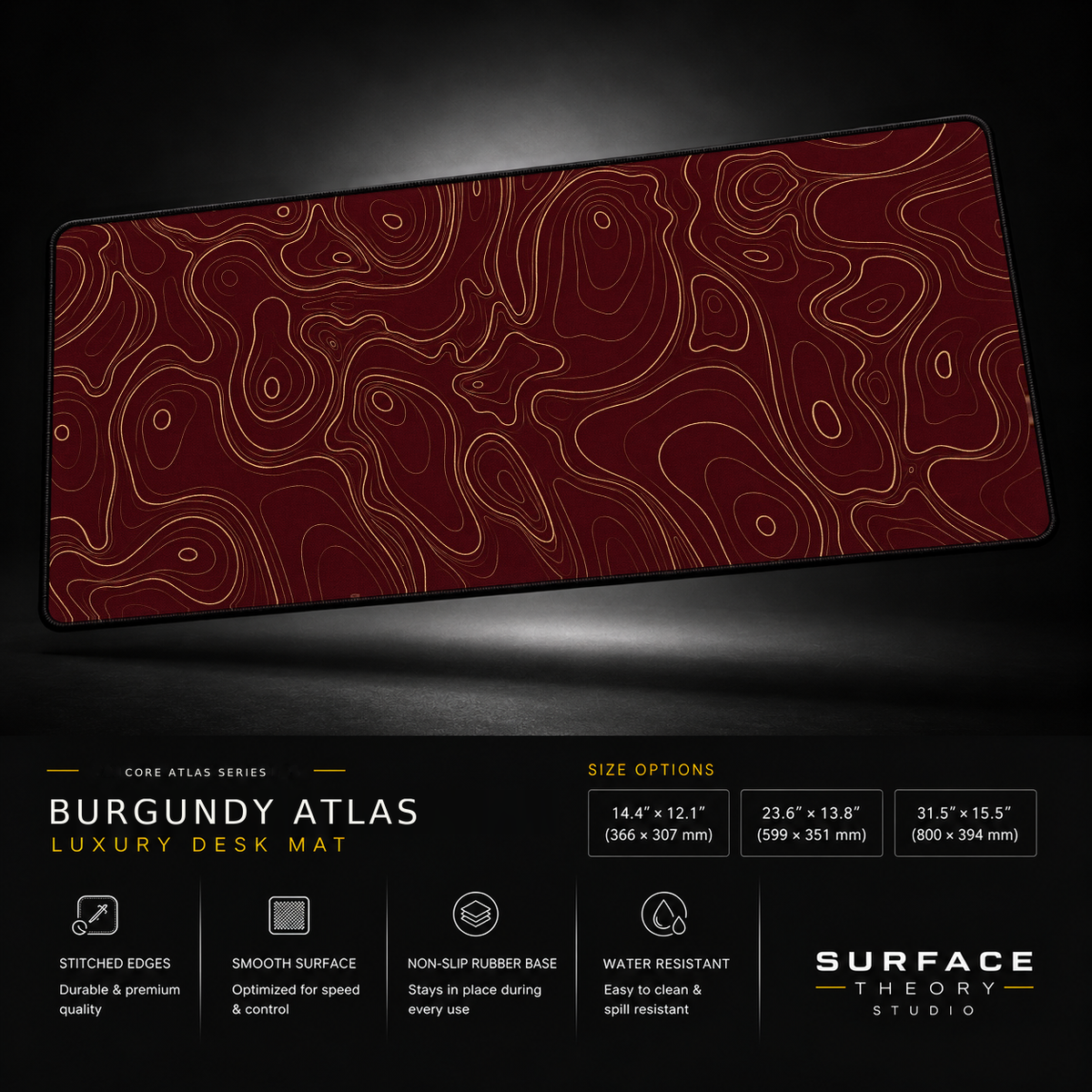 Burgundy Atlas desk mat floating against a dark studio background.