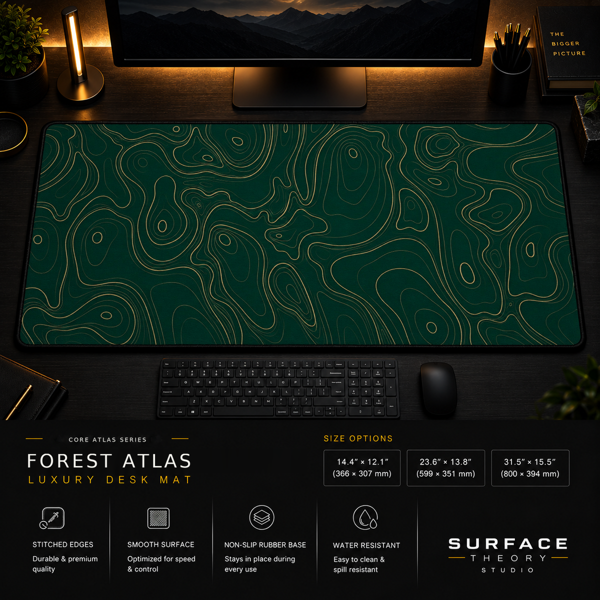 Forest Atlas desk mat in a dark workstation with warm monitor lighting.