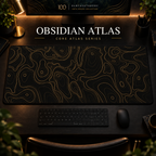 Obsidian Atlas desk mat with fine topographic-inspired contours across the full surface in a warm, dark workspace.
