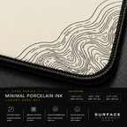 Close-up of Minimal Porcelain Ink printed artwork and black stitched corner.